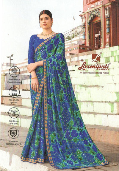 Majestic Royal Blue Georgette Saree with Lush Green Abstract Print