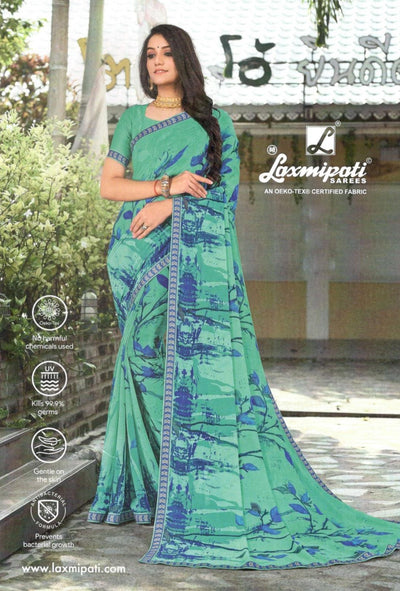 Refreshing Sea Green Georgette Saree with Artistic Blue Abstract Print