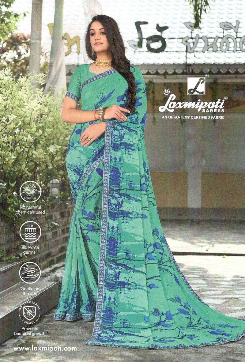 Refreshing Sea Green Georgette Saree with Artistic Blue Abstract Print