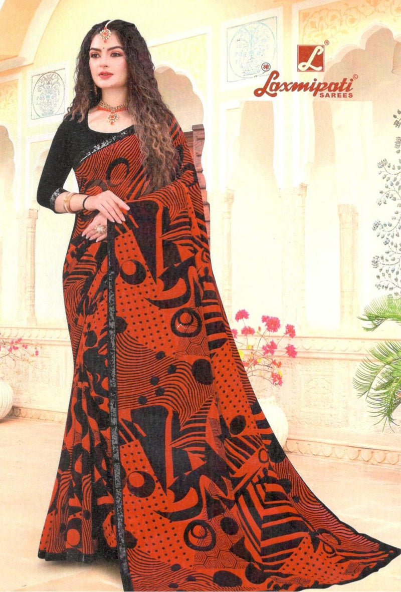 Bold Orange Black Georgette Saree with Striking Tribal Geometric Print