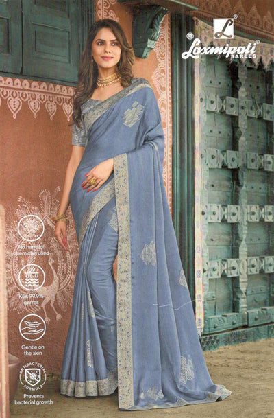Elegant Dusty Blue Georgette Saree with Subtle Zari Print