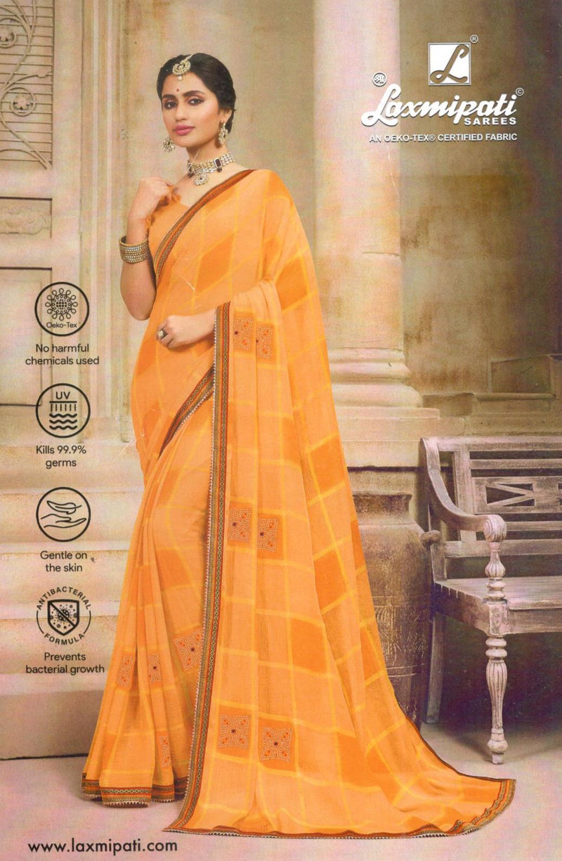 Charming Peach Orange Georgette Saree with Embellished Motifs
