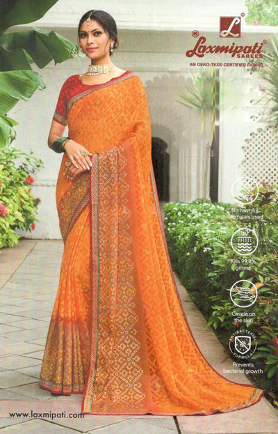 Gorgeous Orange Printed Georgette Saree with Intricate Border