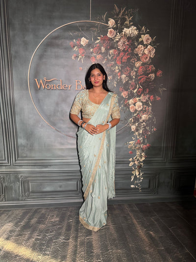 Graceful Sky Blue Shimmer Saree with Intricate Zari Embroidery