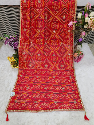 Contemporary Crimson Red Bandhej Saree with Tassels & Sequin Border