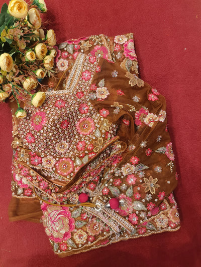 Exquisite Golden Brown Net Saree with Intricate Pink Floral Embroidery