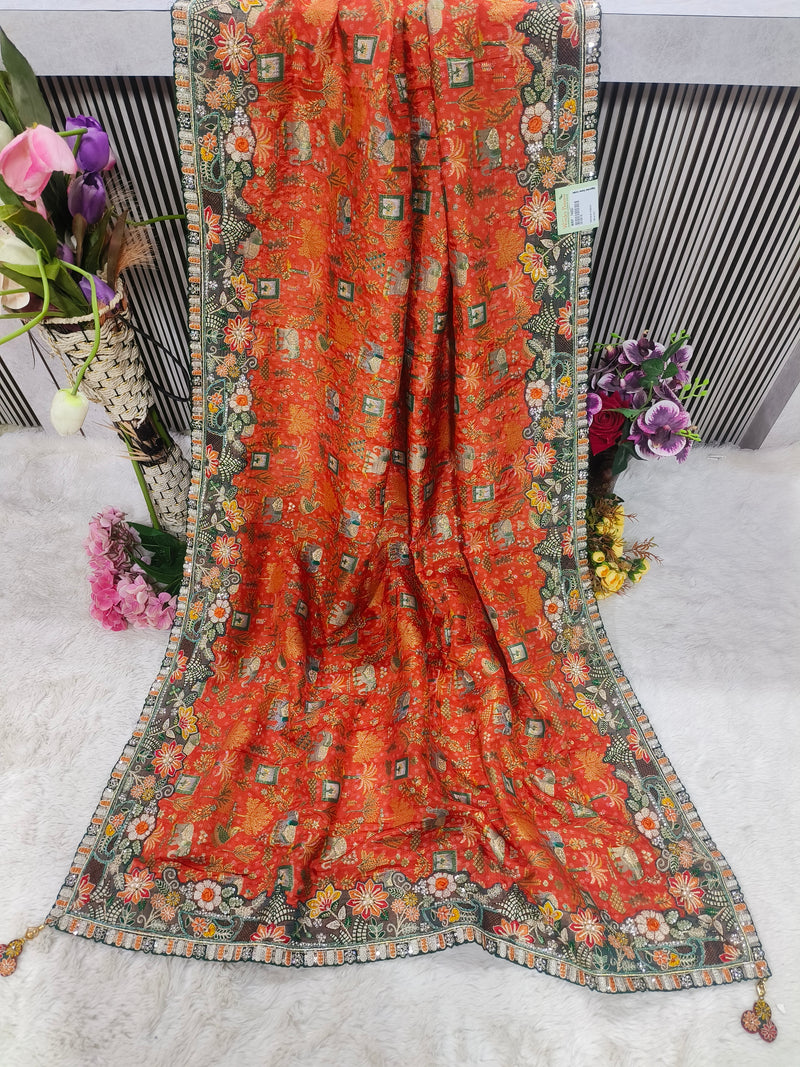 Vibrant Reddish-Orange Designer Saree with Intricate Floral Embroidery