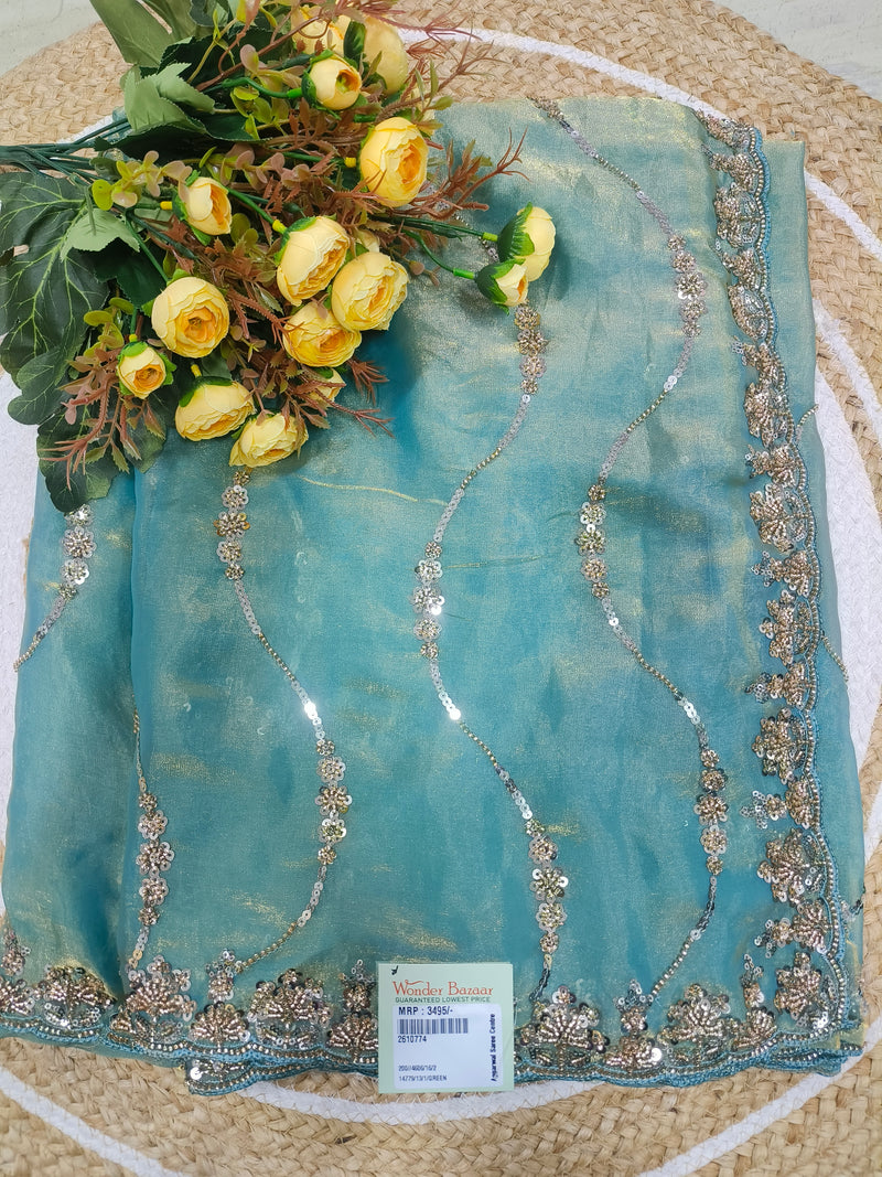 Elegant Cream Georgette Saree with Delicate Sequence & Thread Work