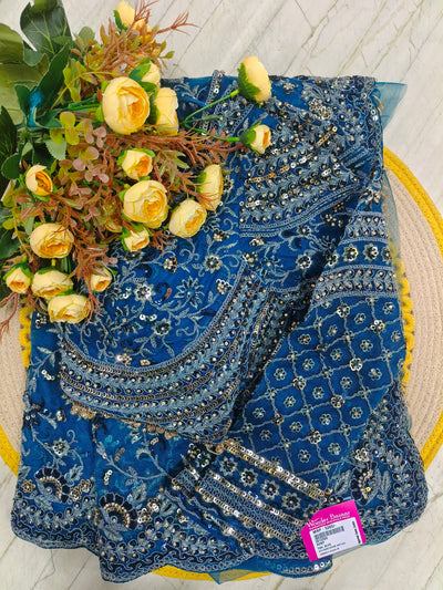 Ethereal Teal Blue Net Saree with Glamorous Silver Sequin Embroidery