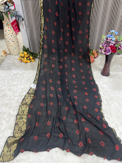 Chic Black Georgette Saree with Red Bandhani Dots & Gold Border