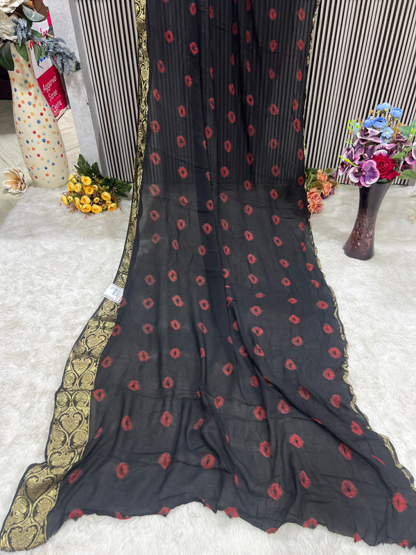 Chic Black Georgette Saree with Red Bandhani Dots & Gold Border