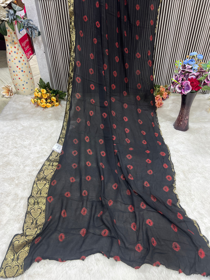 Chic Black Georgette Saree with Red Bandhani Dots & Gold Border