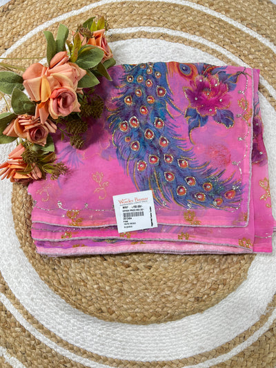 Vibrant Pink Georgette Saree with Enchanting Peacock Print