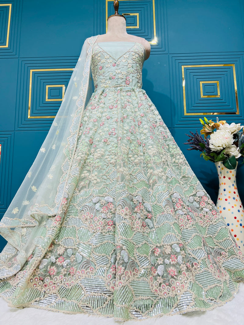 Delicate Mint Green Net Lehenga Choli with Intricate Floral & Geometric Work