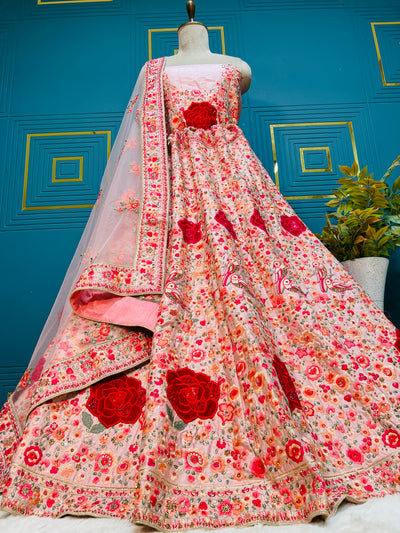 Vibrant Pastel Pink Floral Lehenga with Bold Red Rose Embellishments