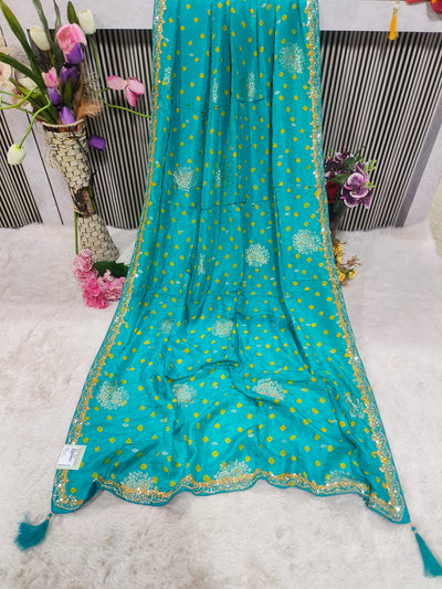 Vibrant Firozi Bandhani Saree with Gota Patti & Sequin Embellishments