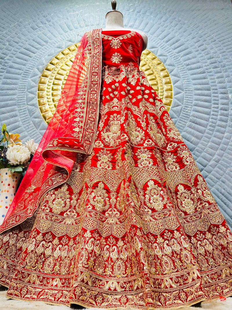 Elegant Crimson Red Bridal Lehenga Set with Intricate Gold Detailing