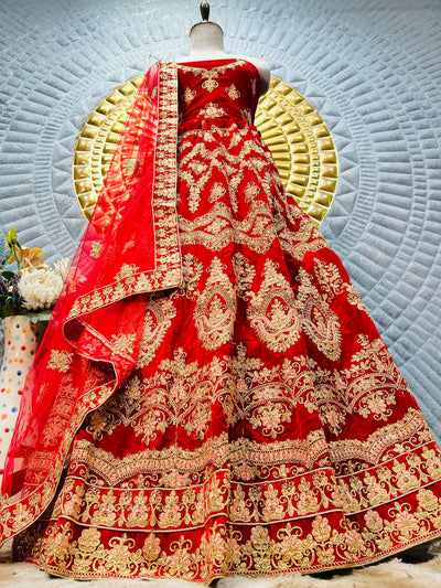 Luxurious Scarlet Red Bridal Lehenga with Traditional Gold Motifs