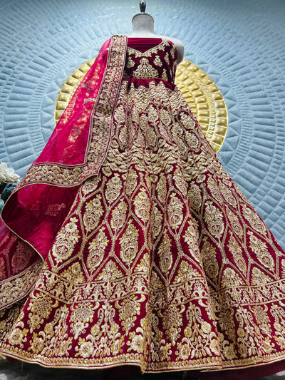 Regal Maroon Velvet Bridal Lehenga with Extensive Gold Zari Embroidery