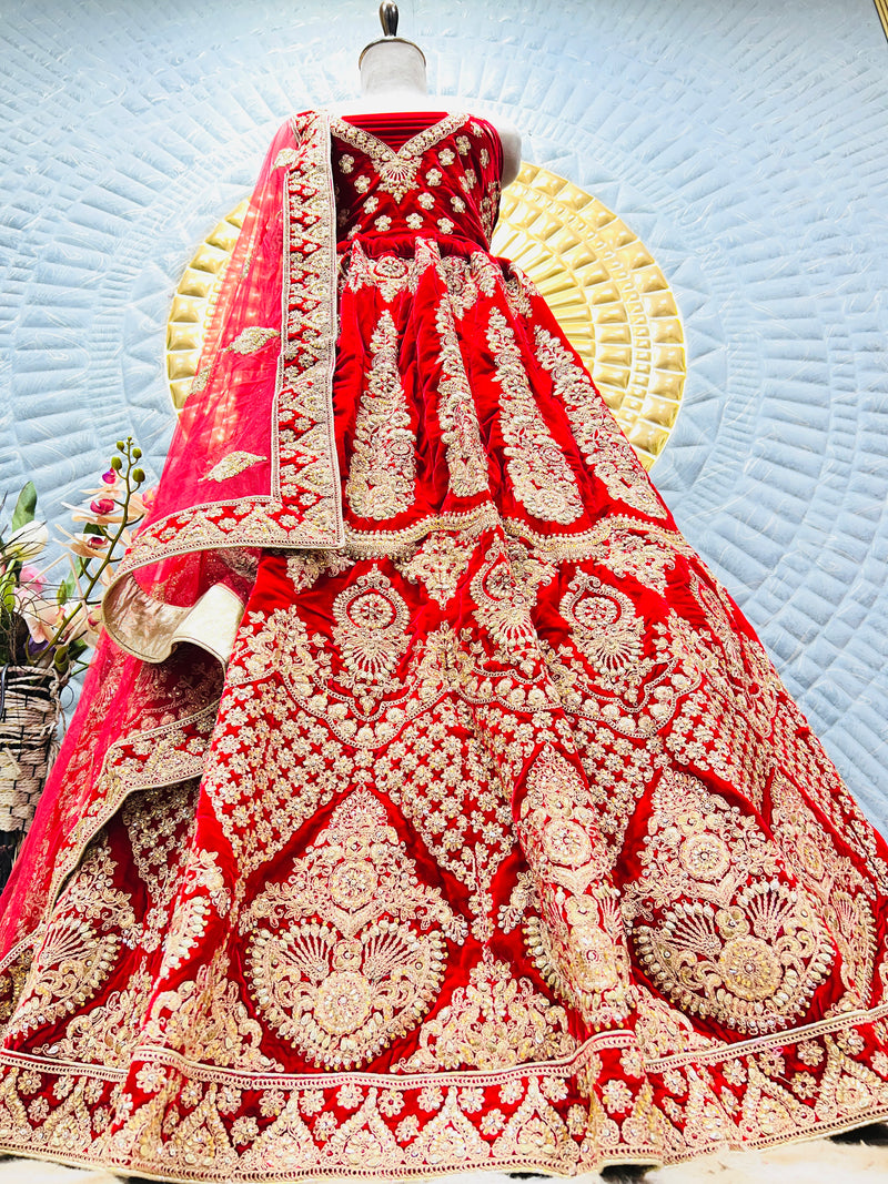 Opulent Radiant Red Velvet Bridal Lehenga with Gold Stones & Pearl Work