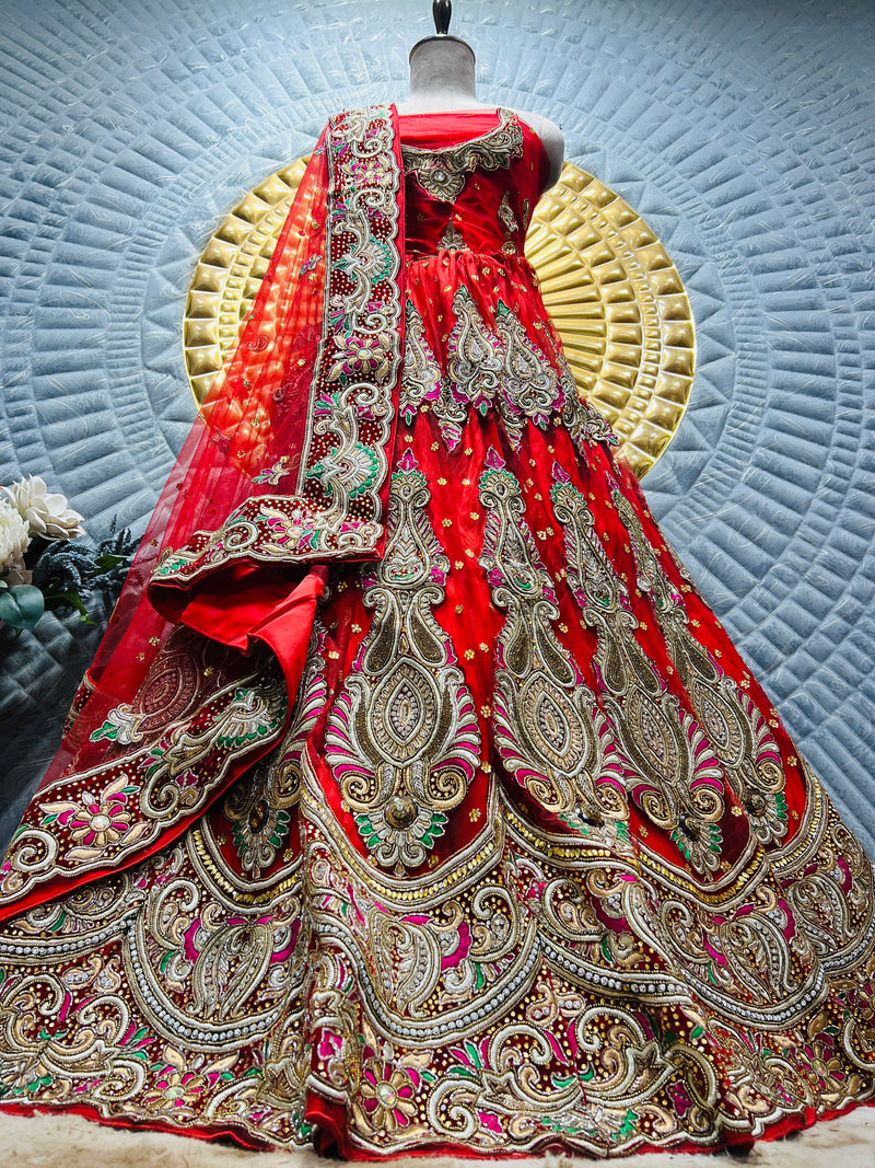 Exquisite Deep Red Bridal Lehenga with Intricate Multi-Color Embroidery
