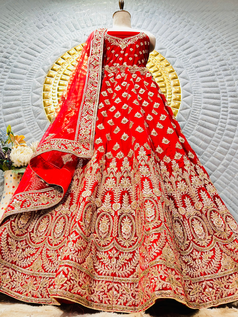 Timeless Red Bridal Lehenga with Heavy Gold Zari Embroidery & Stone Work