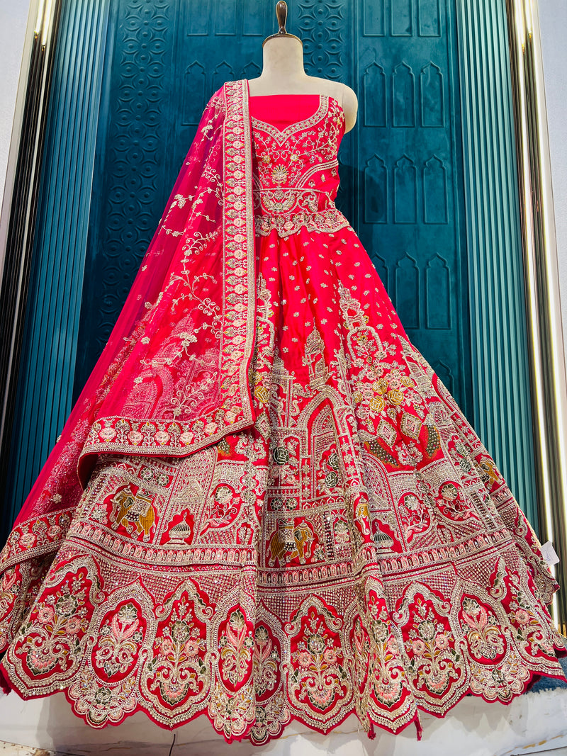 Regal Ruby Red Bridal Lehenga with Gold Zardozi & Elephant Motifs