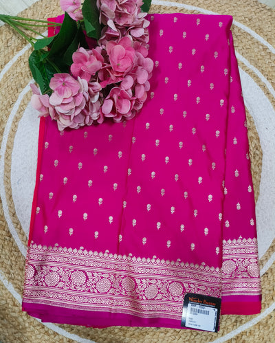 Exquisite Rani Pink Banarasi Silk Saree with Golden Zari Motifs