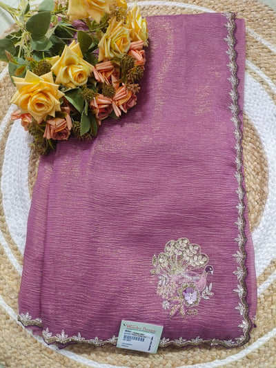 Graceful Mauve Georgette Saree with Peacock Zari Motif
