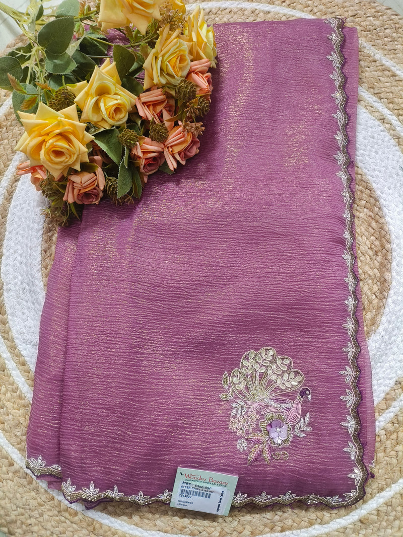 Graceful Mauve Georgette Saree with Peacock Zari Motif