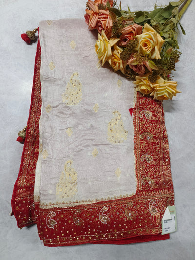 Elegant Off-White Silk Saree with Traditional Red Embroidered Border