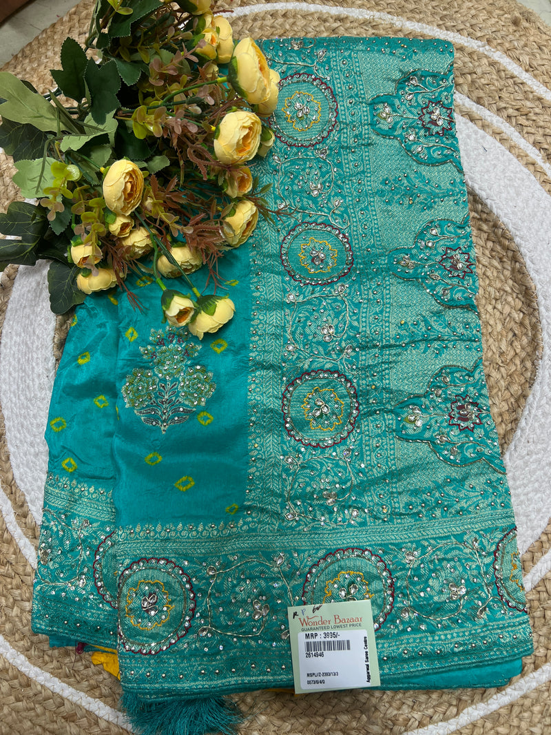 Radiant Sea Green Silk Saree with Intricate Stone and Zari Work