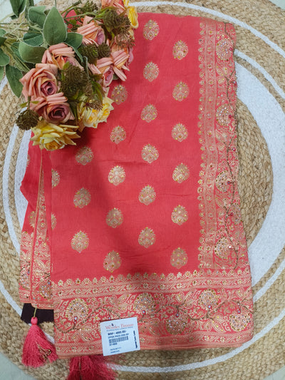 Elegant Coral Pink Saree with Intricate Floral Gold Motifs