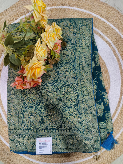 Opulent Teal Green Zari Woven Saree with Tassel Details