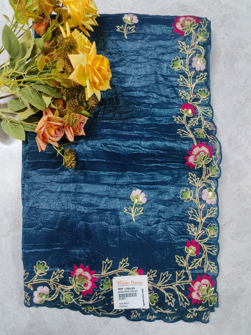 Enchanting Deep Blue Textured Saree with Vibrant Floral Embroidery