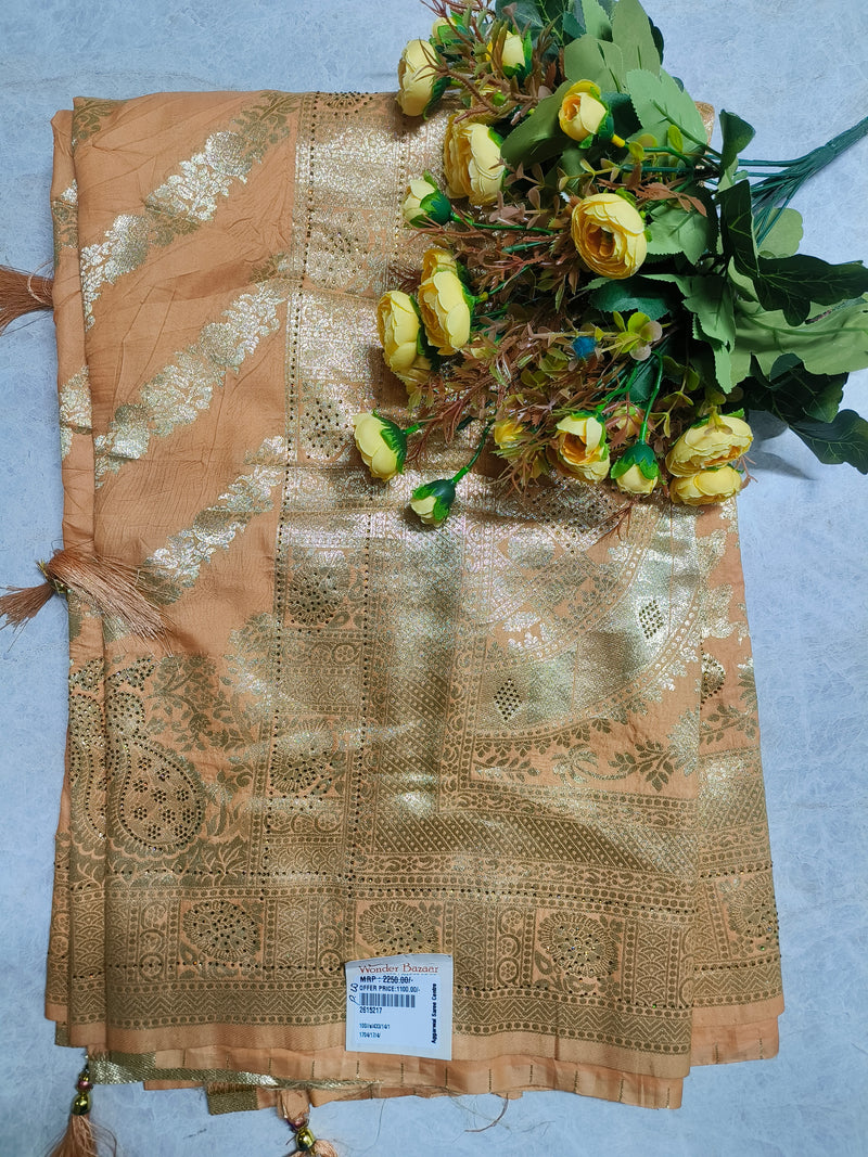 Sophisticated Peach Georgette Saree with Gold Zari Embroidery and Tassels
