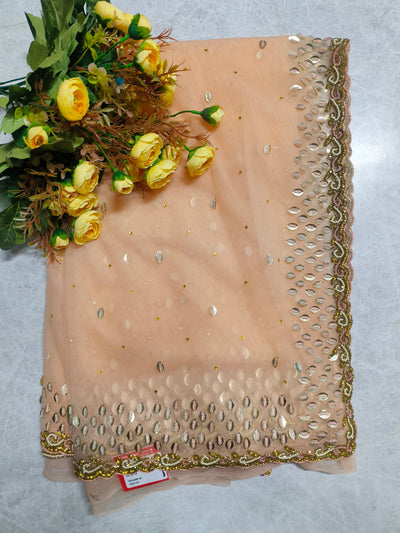 Glamorous Peach-Pink Net Saree with Heavy Gold Sequin and Pearl Border