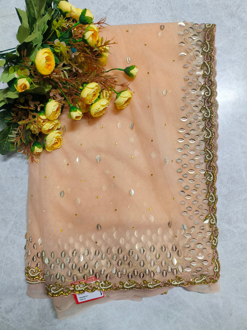 Glamorous Peach-Pink Net Saree with Heavy Gold Sequin and Pearl Border