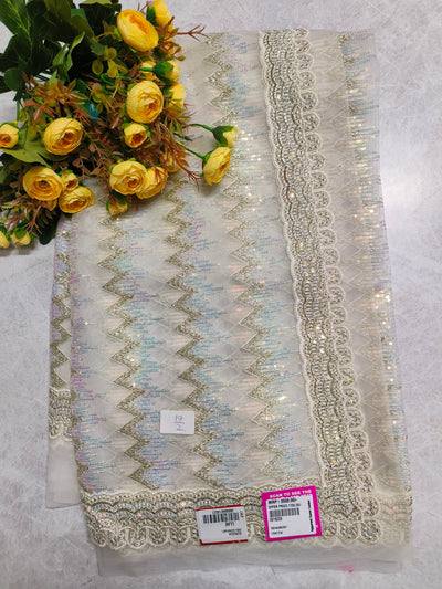 Graceful Cream Net Saree with Shimmering Sequin Zigzag Embroidery