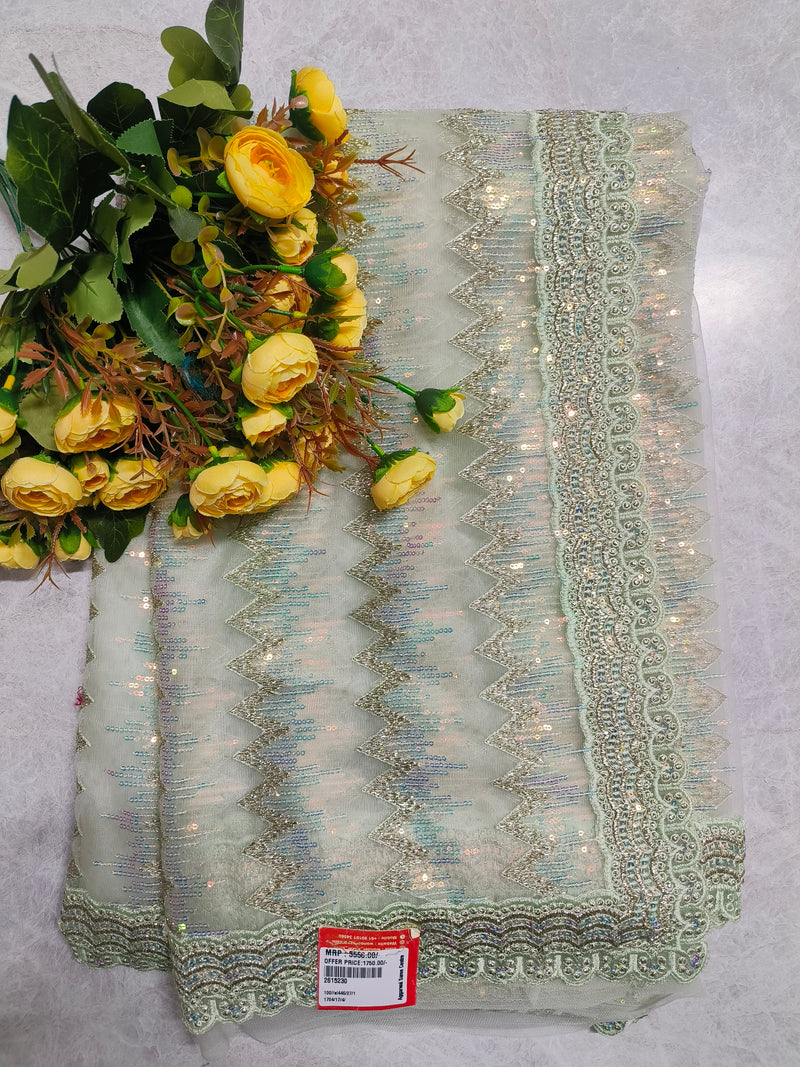 Radiant Mint Green Net Saree with Silver Sequin Work