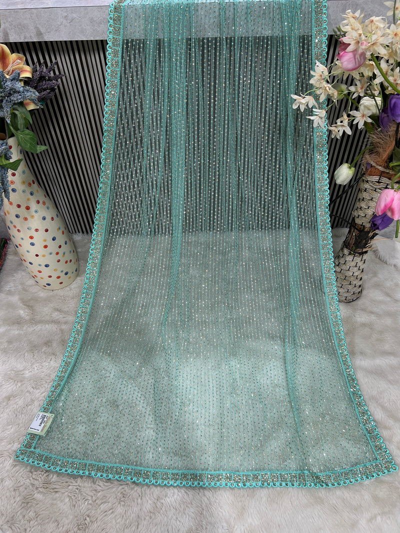 Delicate Onion Pink Net Saree with Vertical Bead & Sequin Embellishments