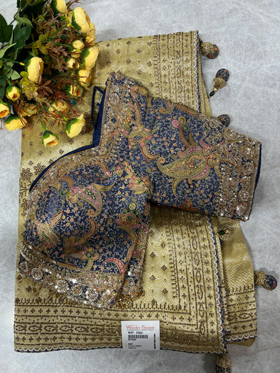 Exquisite Gold Shimmer Saree with Navy Blue Paisley Printed Blouse