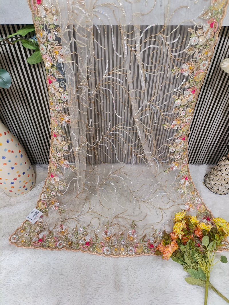Enchanting Blush Pink Net Saree with Intricate Floral Sequin Embroidery
