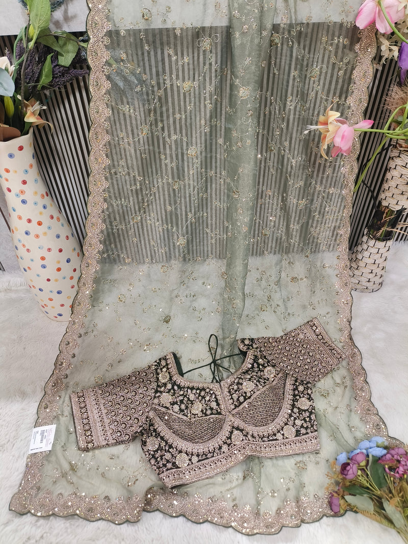 Graceful Dusty Rose Net Saree with Heavy Sequin Embroidery
