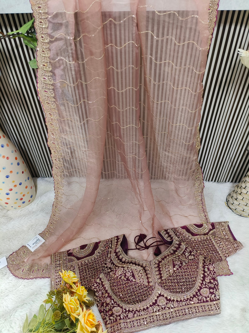 Glamorous Rose Dust Net Saree with Heavily Embroidered Wine Blouse