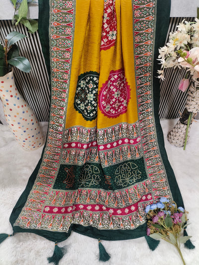 Festive Yellow and Bottle Green Bandhani Silk Saree with Tassels