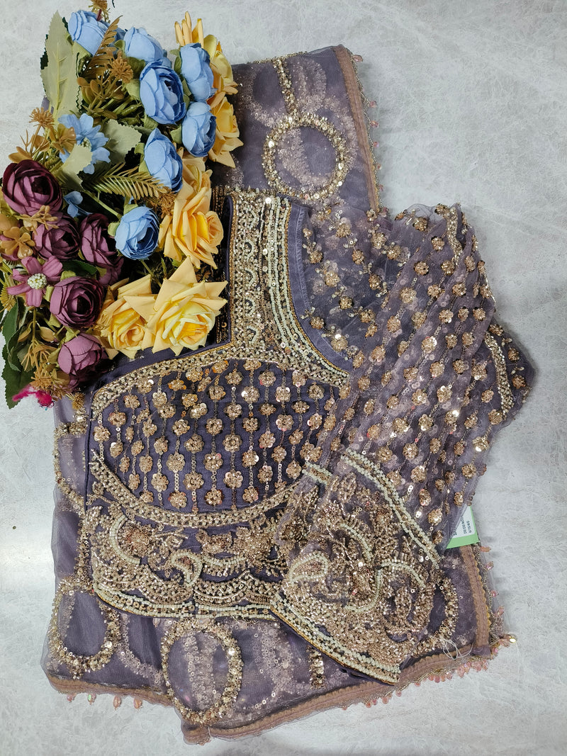 Elegant Beige Net Saree with Intricate Floral Sequin Embroidery