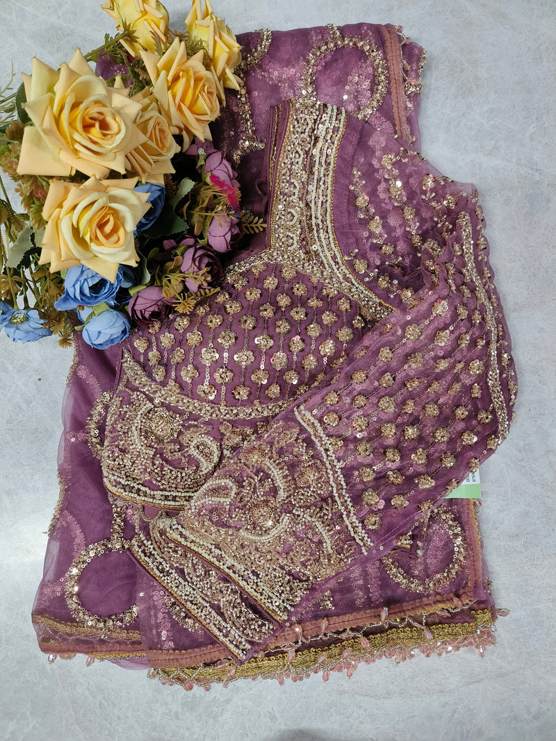 Elegant Beige Net Saree with Intricate Floral Sequin Embroidery