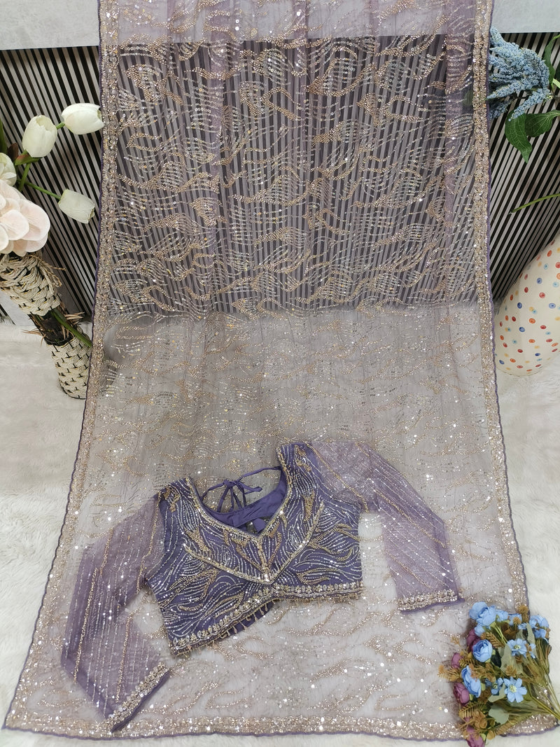 Glamorous Lavender Sequence Net Saree with Matching Designer Blouse