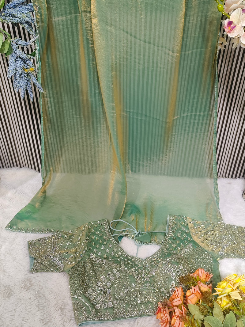 Shimmering Sage Green Organza Saree with Heavy Mirror Work Blouse